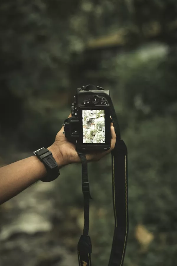 Photographer holding a camera